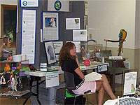 Alayne Rueber staffs the MAARS booth at the Animal Ark Hastings shelter during their 15-hour adopt-a-thon. 