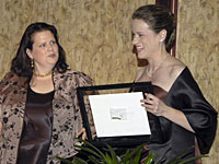 MAARS Volunteer & Training Director Jamie McCarthy presented a MAARS Volunteer of the Year Award to Sue Larson (right) at the Gala on November 10. (Photo by Chris Gannon)